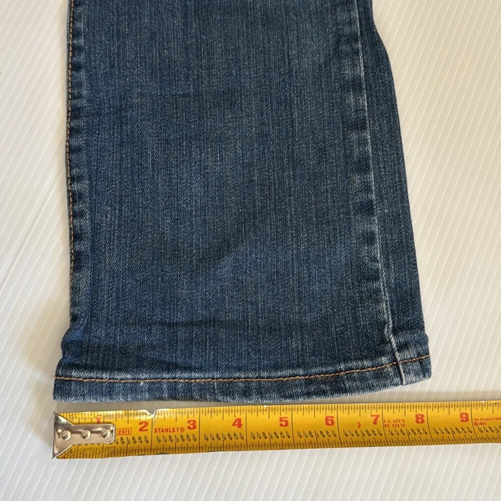Old Navy bootcut blue jeans.  Girls size 12 plus